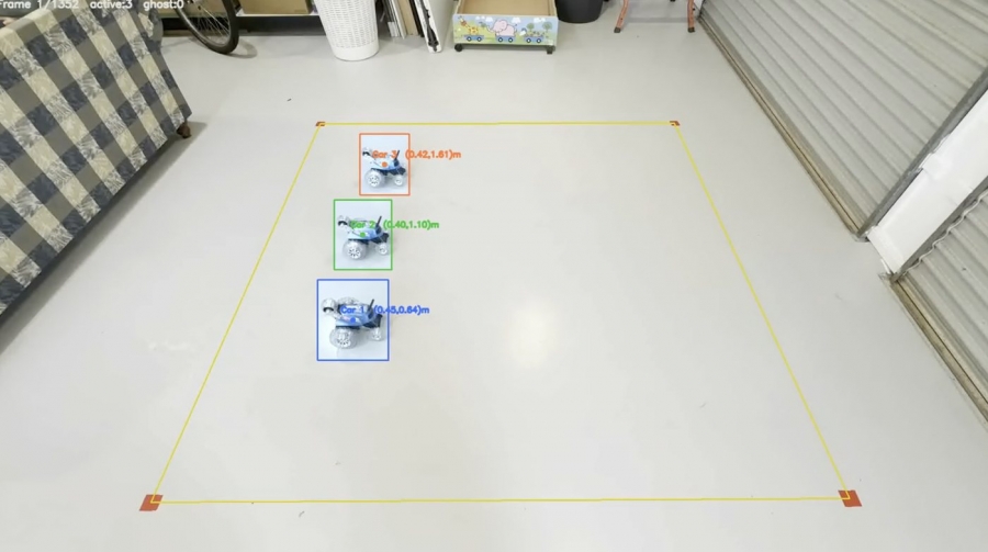 Three RC vehicles tracked in a calibrated arena