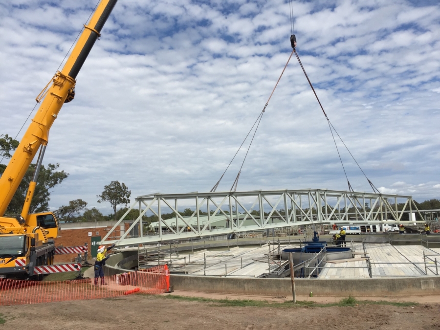 FRP gas-harvesting cover module being installed by crane at a Queensland wastewater-treatment plant
